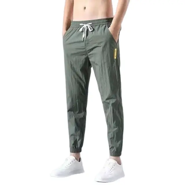 Erkek giyim sonbahar kış Sweatpants elastik Baggy Casual pantolon pantolon Mens için yüksek kalite kırpılmış pantolon Sweatpants