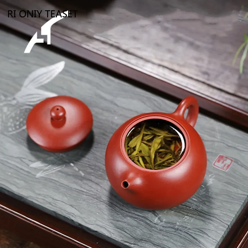 High-end Yixing mor kil demlik ünlü el yapımı top delikli filtre Xishi demlik ham cevher Dahongpao su ısıtıcısı Zisha çay seti hediyeler